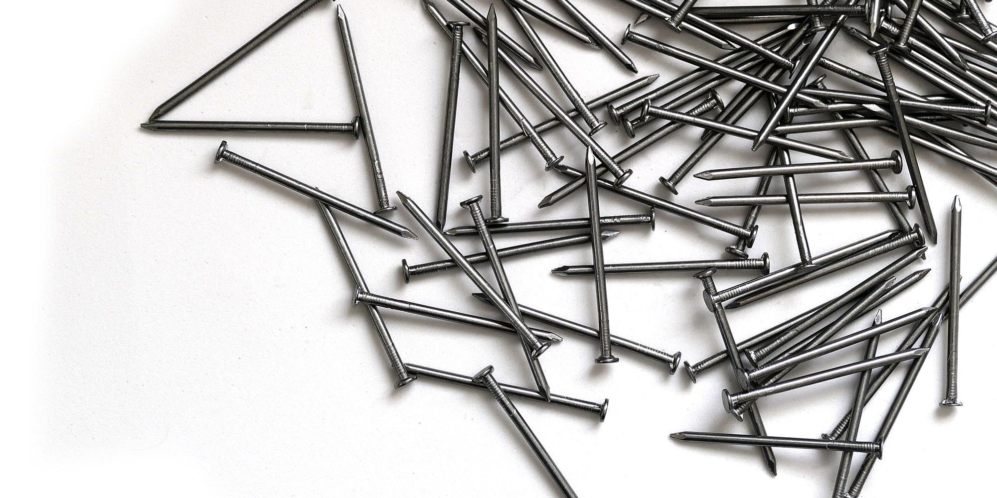 construction-nails-large-amount-nails-white-background